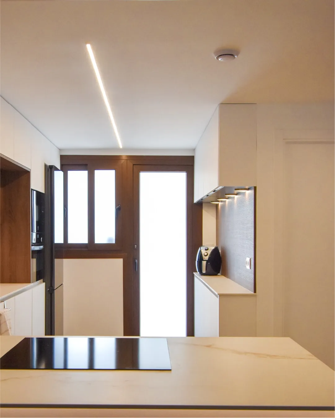 Cocina puente con península