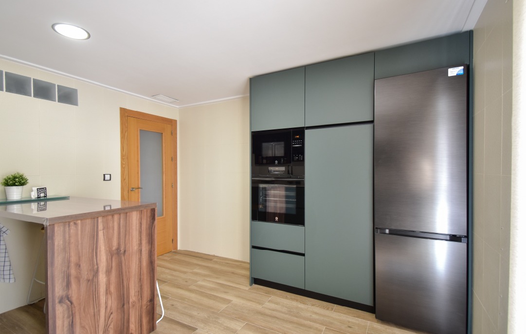 Original cocina verde y roble